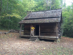 Bekki in front of our cabin.  (just kidding, actually an old cabin in the NP)